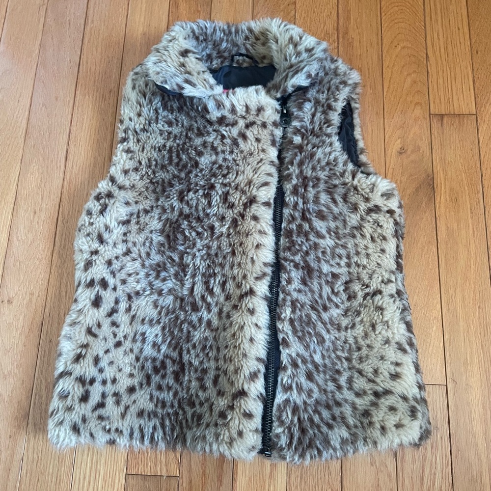 A cheeta print furry vest for girls